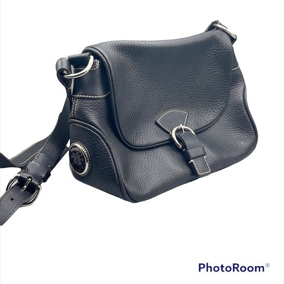 Dooney & Bourke Handbags - Dooney & Bourke leather flap - snap button crossbody bag.